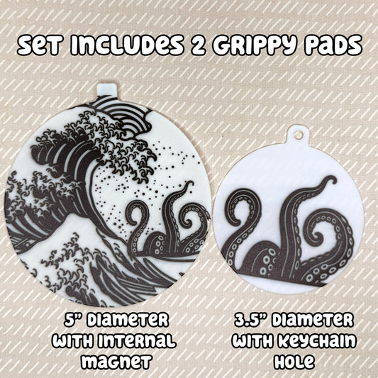 Two circular Kraken-themed Grippy Pads are shown atop a beige background. Text reads, "Set includes 2 Grippy Pads. 5" Diameter with internal magnet. 3.5" diameter with keychain hole."