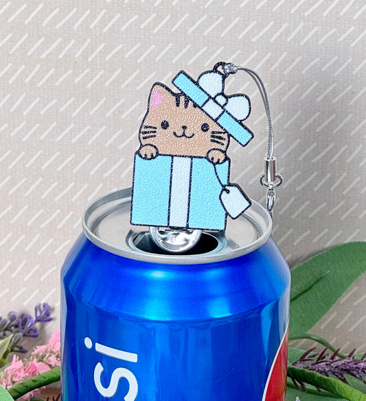 Tab Buddy keychain with a cat design on top of a can