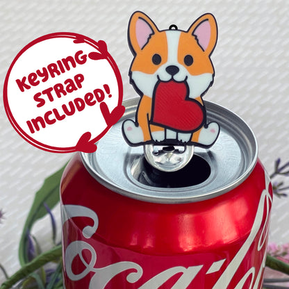Soda can with a dog-shaped Tab Buddy on top, featuring a speech bubble indicating 'Keyring strap included!'.