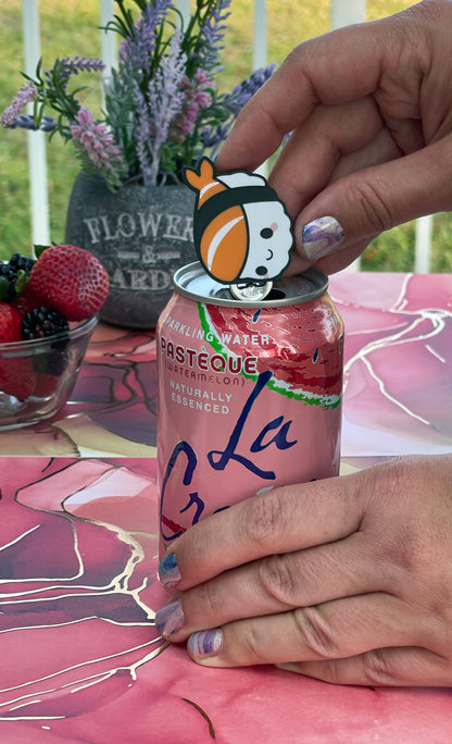 Person using a nigiri Tab Buddy on a can of sparkling water.