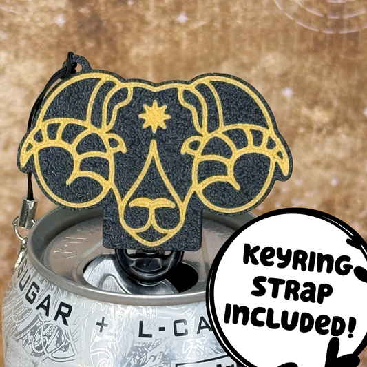 Tab Buddy with an Aries Zodiac ram design sits atop a can. Text reads: "keyring strap included"