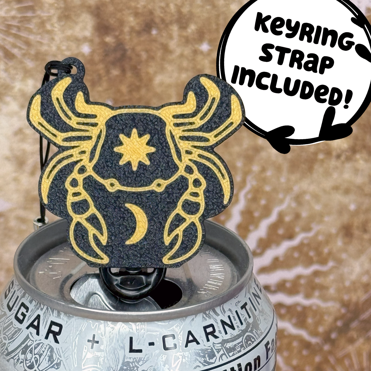 Tab Buddy Cancer zodiac design on top of a soda can, with text 'Keyring strap included!'.