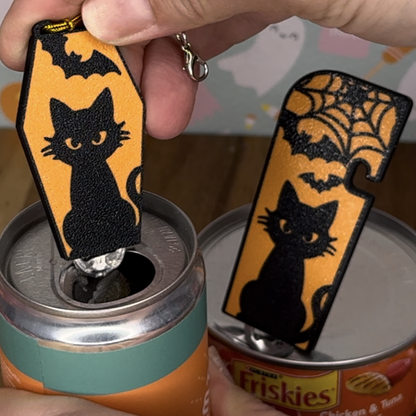 Matching set of Halloween-themed soda Tab Buddy and Tab Buddy XL  are shown on soda and cat food can tabs.