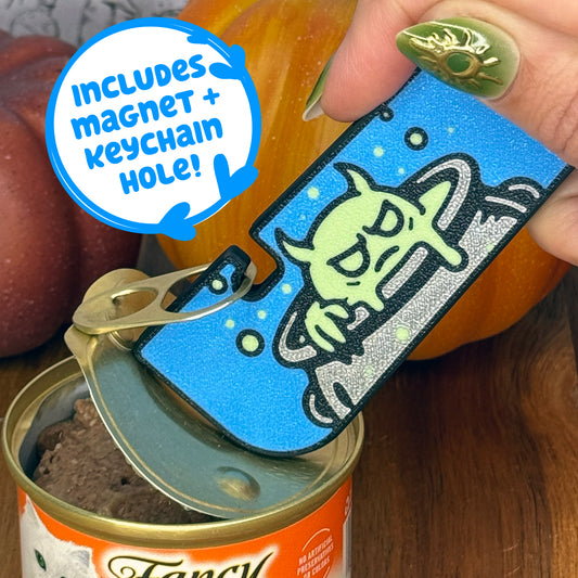Tab Buddy XL with magnet and keychain hole is used to open a can of cat food.