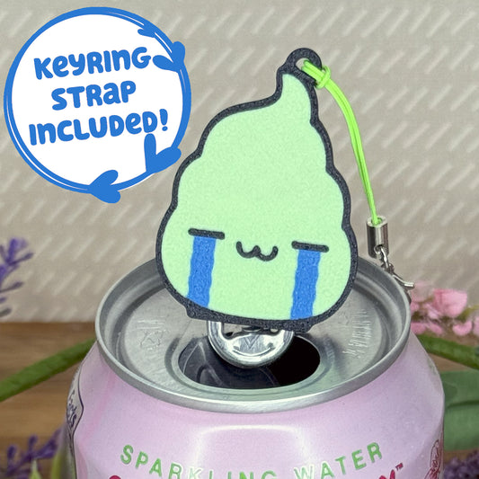 Design of a dollop wasabi with a crying face Tab Buddy on a can of sparkling water with text that reads 'keyring strap included!'
