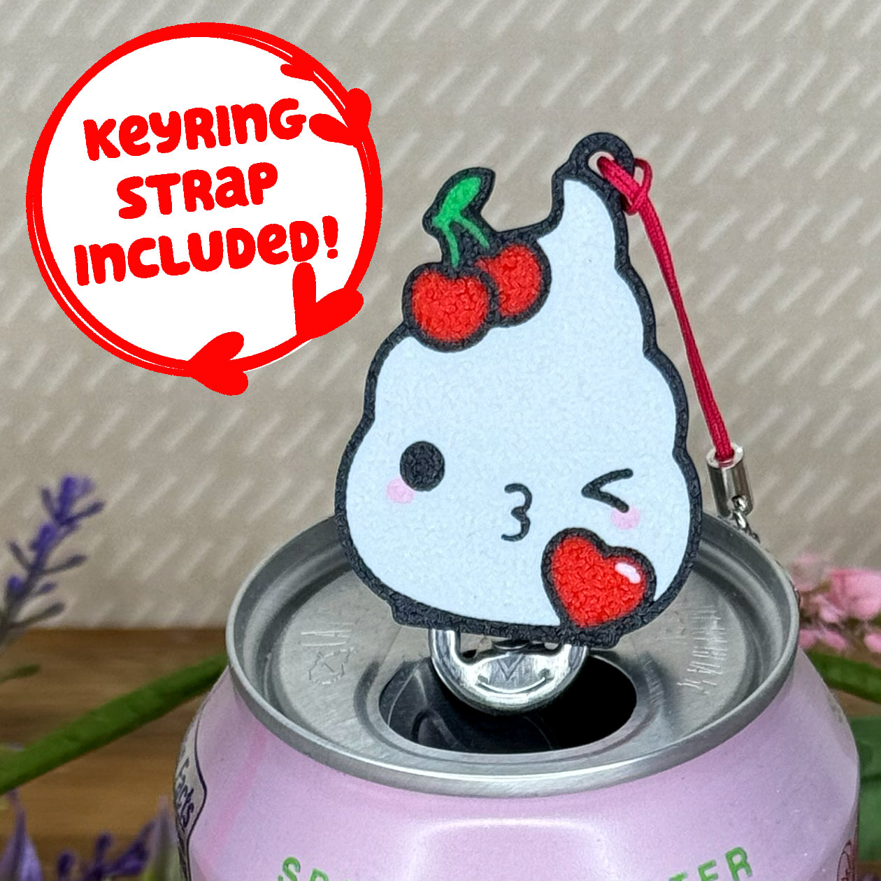 Tab Buddy with a cute design of whipped cream on top of a pink can, with a 'Keyring Strap Included!' label.