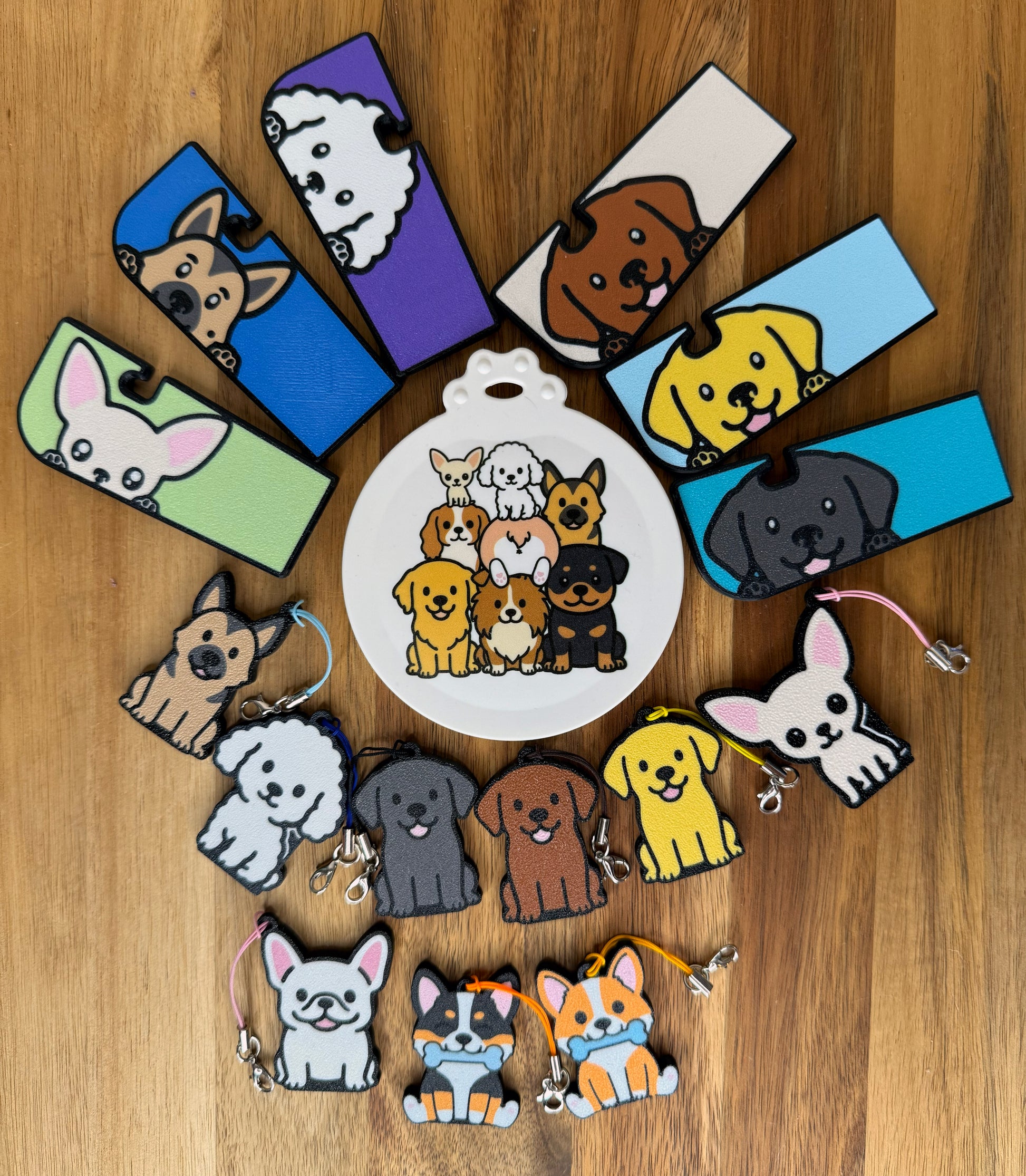 Collection of dog-themed Tab Buddy products arranged in a circular pattern on a wooden surface.
