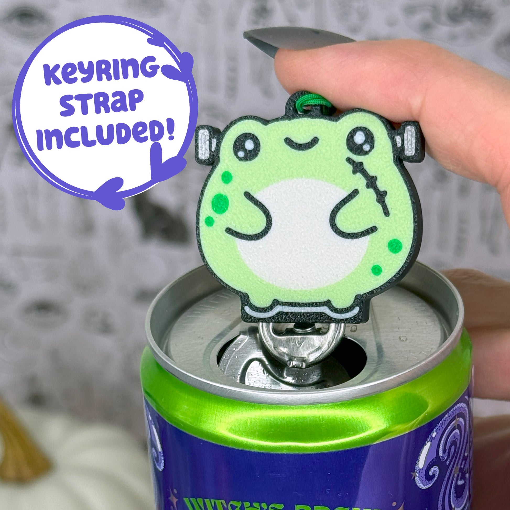 Green Frankenstein frog Tab Buddy with text 'Keyring strap included!'.