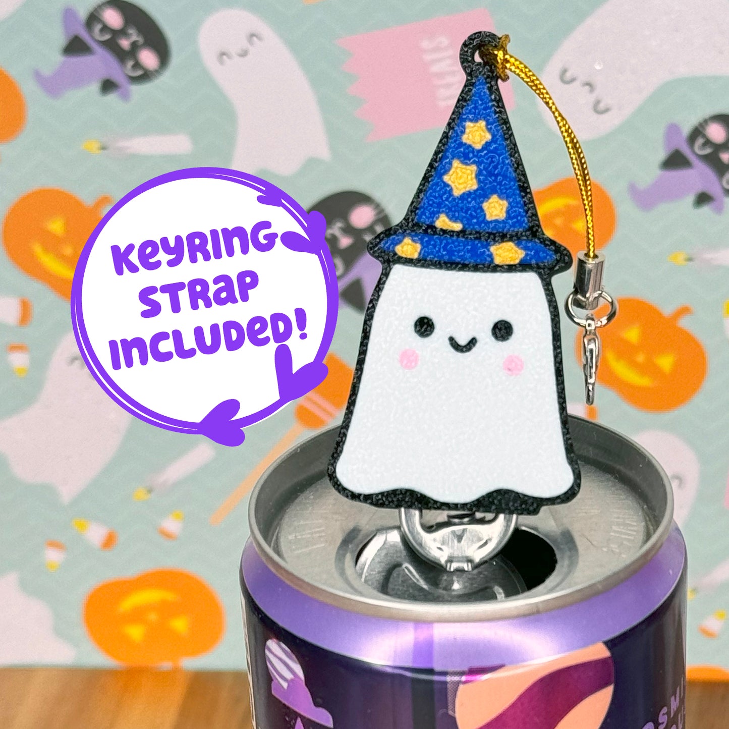 Ghost wizard Tab Buddy rests atop a can, with Halloween-themed background
