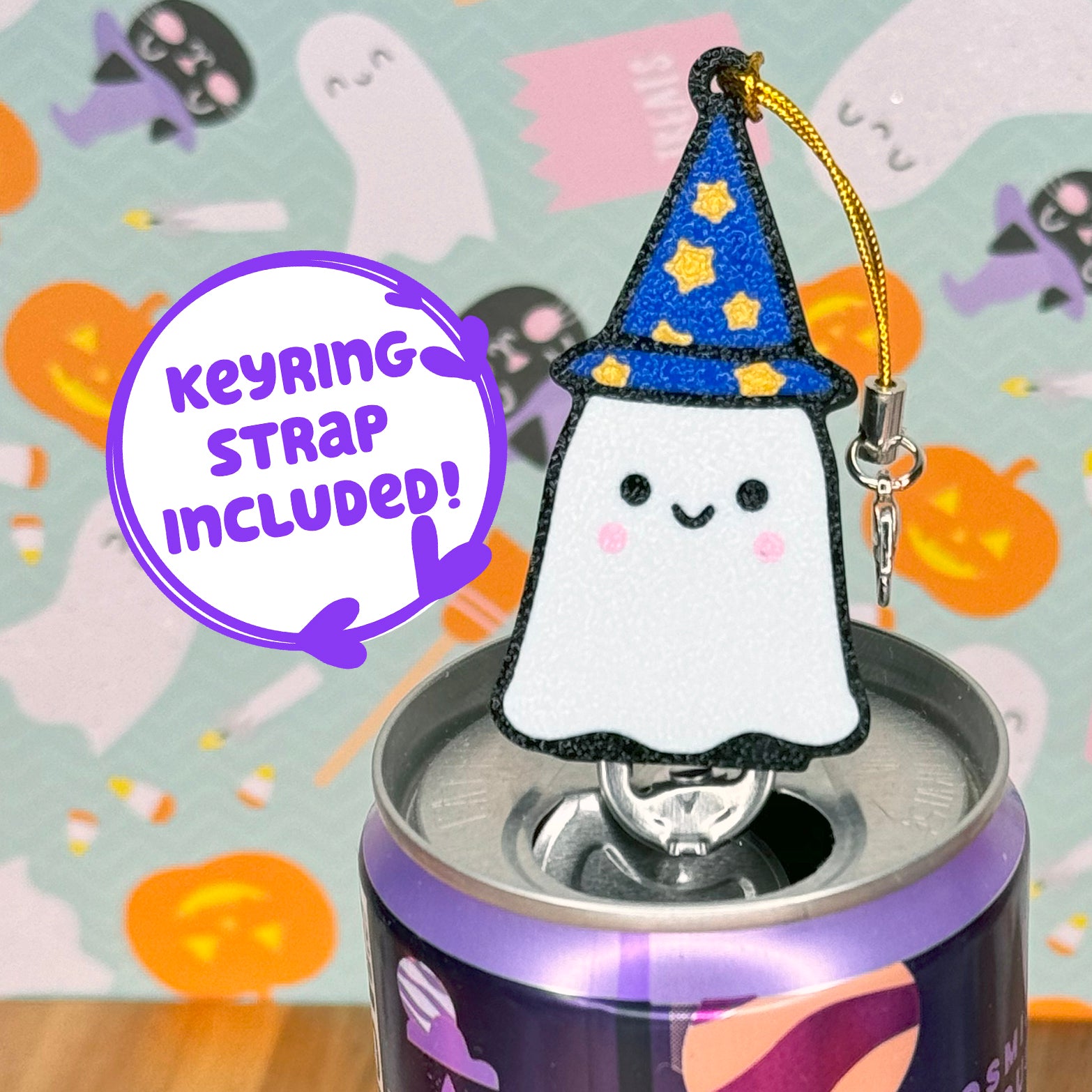 Ghost wizard Tab Buddy rests atop a can, with Halloween-themed background