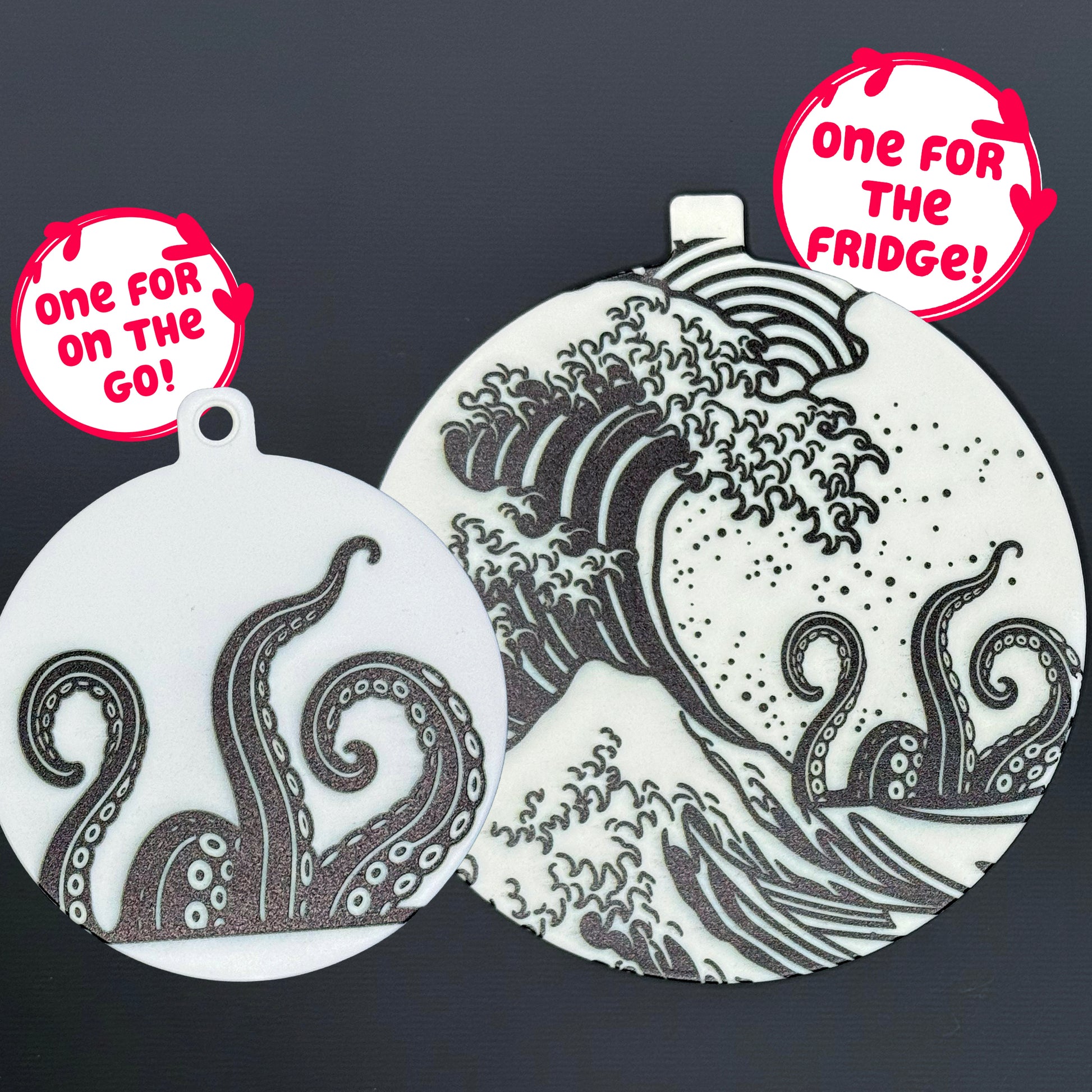 Two circular kraken-themed Grippy pads are shown against a grey background. Text bubbles read, "One for the fridge," and "One for on the go!"