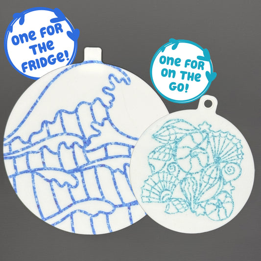 Two circular ocean and shells-themed Grippy pads are shown against a grey background. Text bubbles read, "One for the fridge," and "One for on the go!"