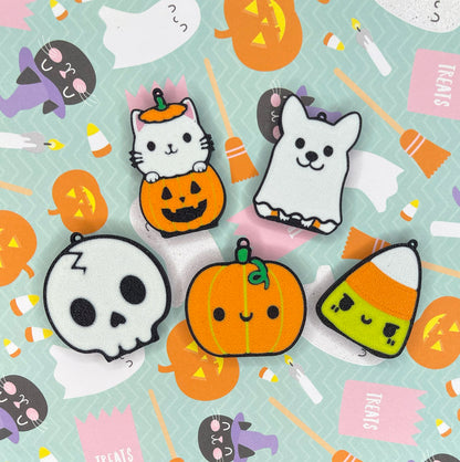 Set of 5 Halloween-themed Tab Buddies with pumpkins, ghosts, and cats on a light blue background.