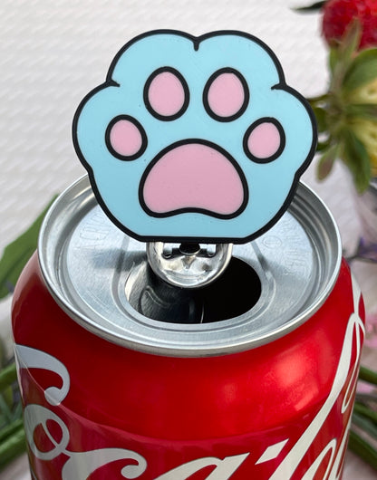 Coca-Cola can with a blue paw print Tab Buddyon top