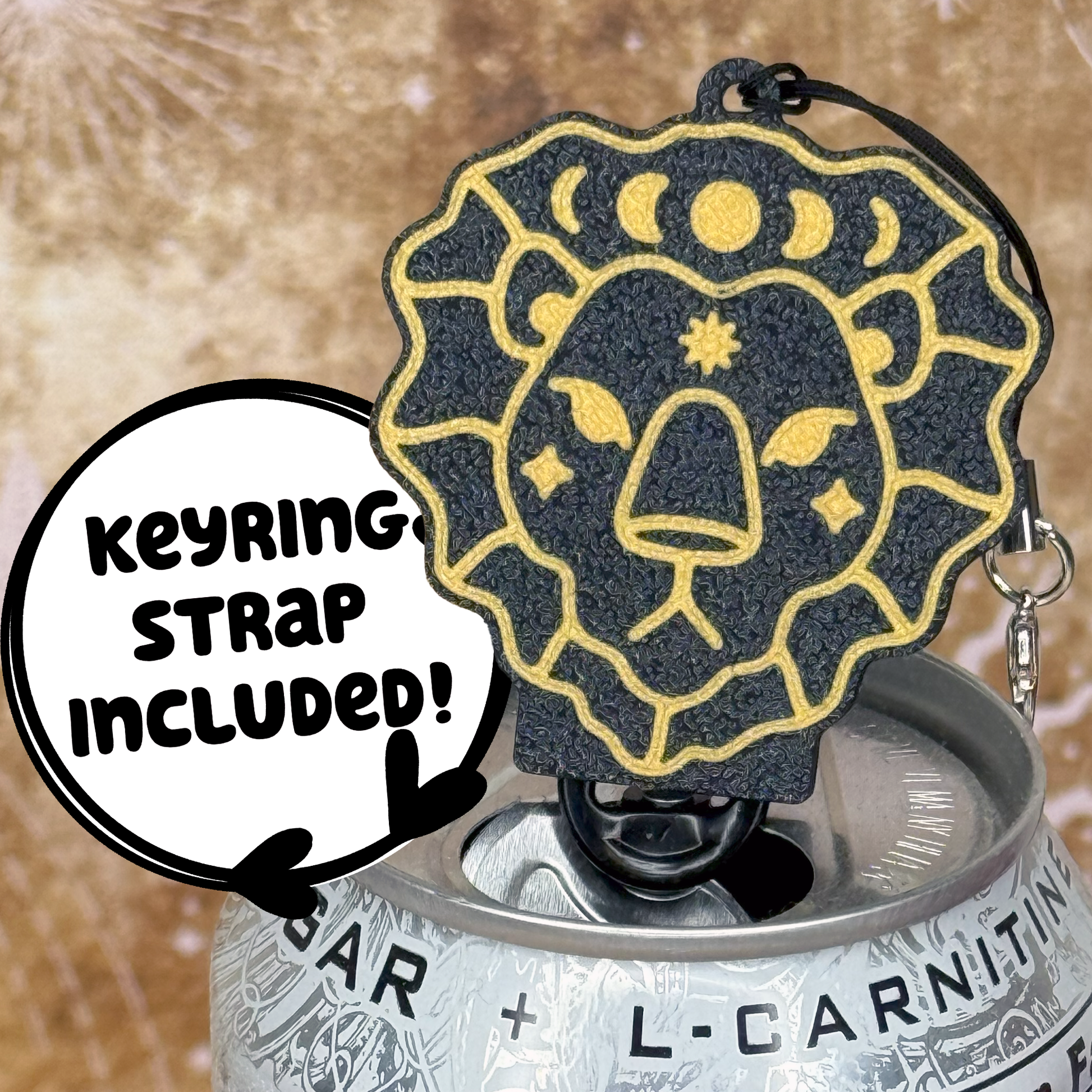 Tab Buddy keychain with Zodiac leo lion design on a can