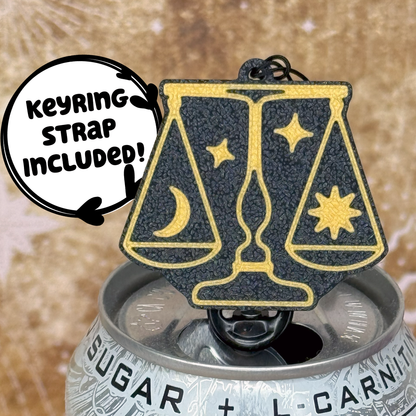 Tab Buddy with gold and black Libra zodiac design on a can, featuring a 'Keyring Strap Included!' label.