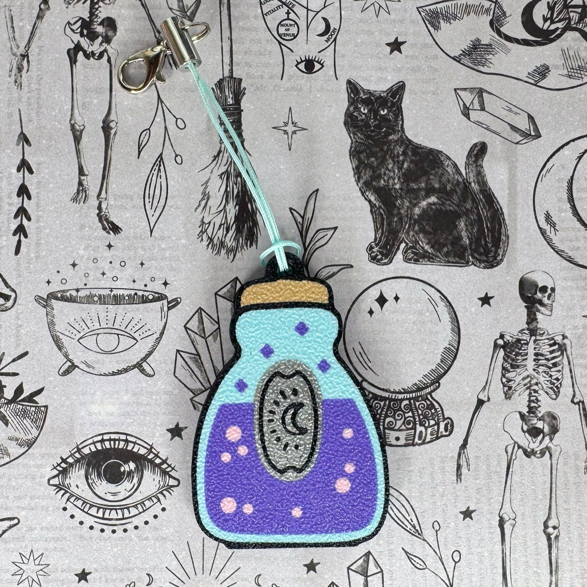 Purple potion bottle Tab Buddy design on a mystical patterned background