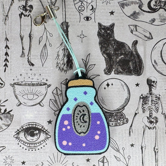 Purple potion bottle Tab Buddy design on a mystical patterned background