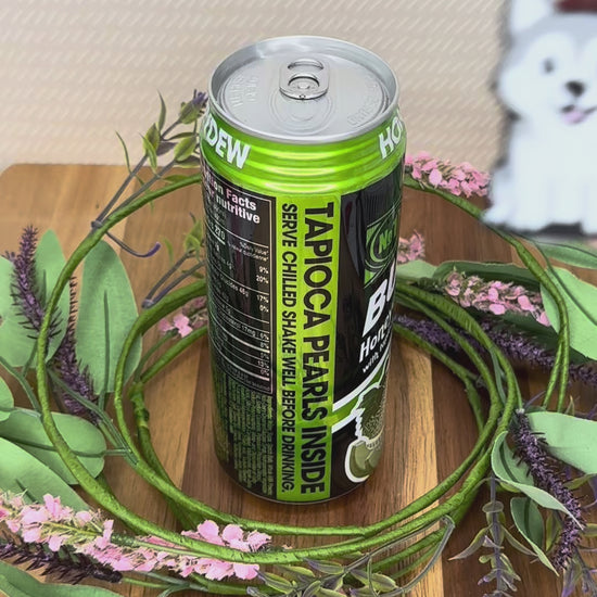 A soda-sized Husky Tab Buddy is used to open a can of bubble tea. More cute dog Tab Buddies are shown.