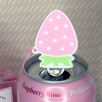 Pink can with a pink strawberry-shaped Tab Buddy