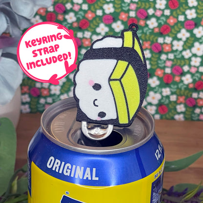 Tamago Tab Buddy on a can with a colorful background text reads 'keyring strap included!'