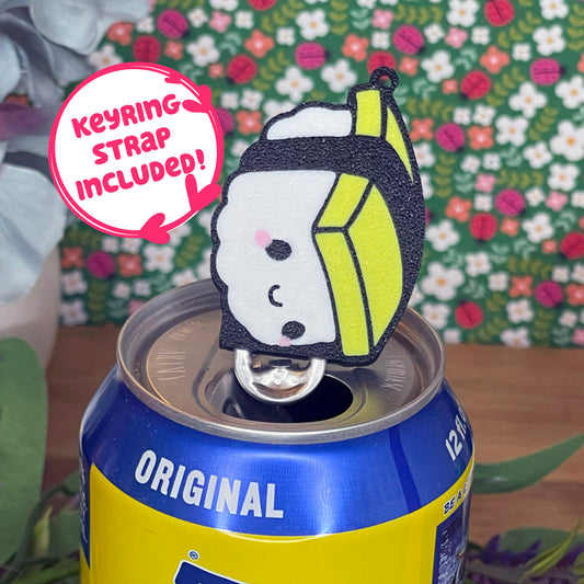 Tamago Tab Buddy on a can with a colorful background text reads 'keyring strap included!'