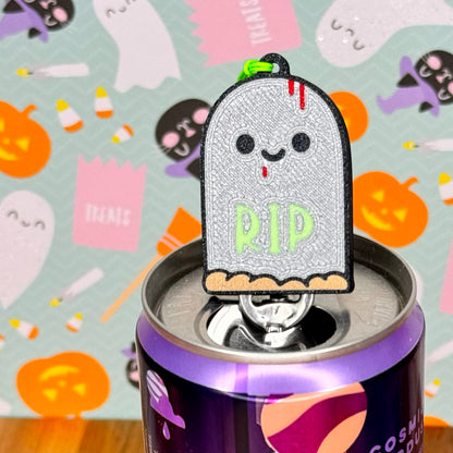 Halloween-themed Tab Buddy with a tombstone design on a colorful background