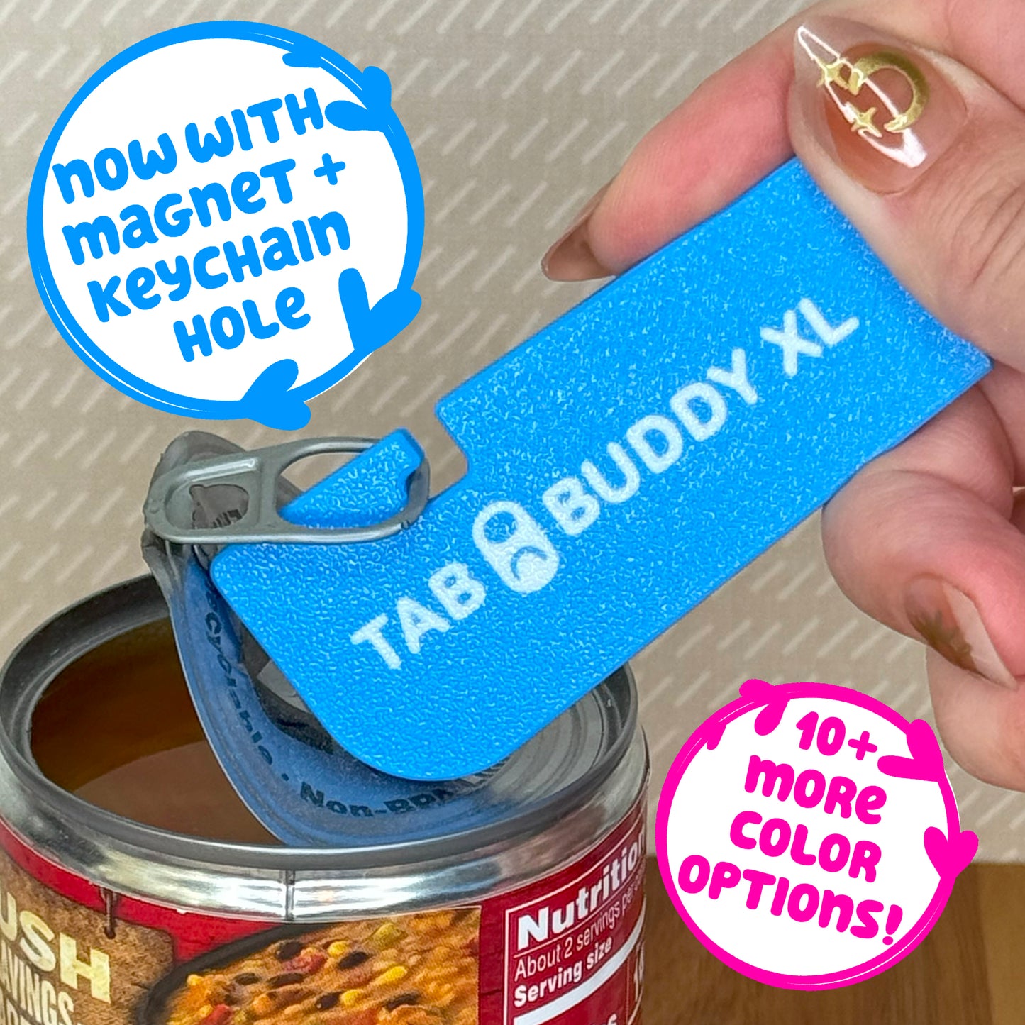 Sky Blue Tab Buddy XL can opener with magnet and keychain hole feature, held over a can. Featured text reads "10+ more color options"